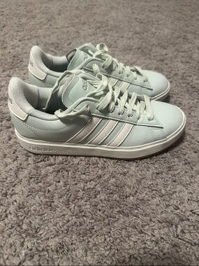 adidas Mint Green Low-Top Sneakers with White Stripes